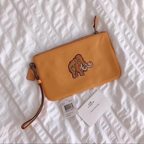 Coach Handbags - NEW Coach Limited Edition Beast Small Wristlet